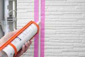 奈良の香芝市の株式会社ヨネヤの外壁塗装と屋根塗装のコーキング充填